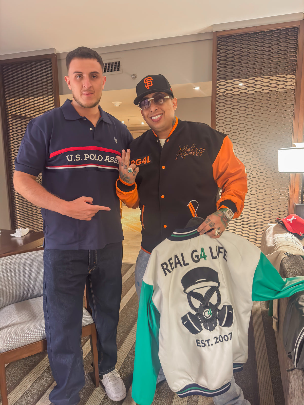Xtextile founder César with Ñengo Flow in Lima