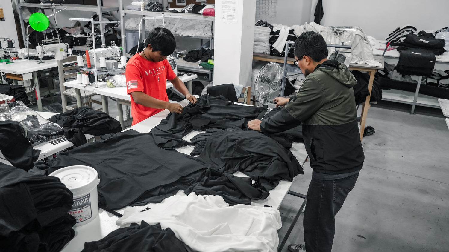 Xtextile workshop team producing Chencho Corleone merchandise