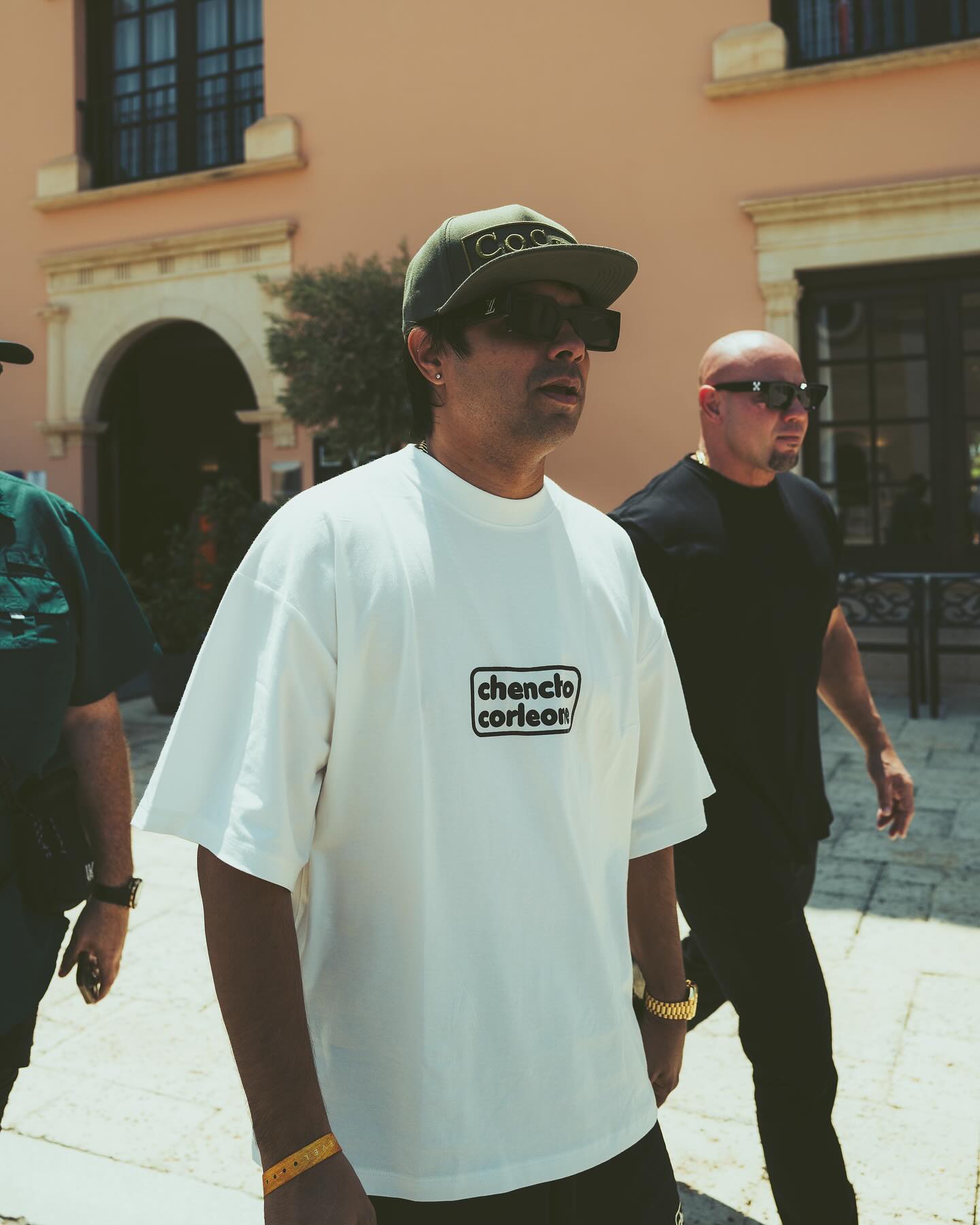 Chencho Corleone wearing the off-white oversized T-shirt customized by Xtextile