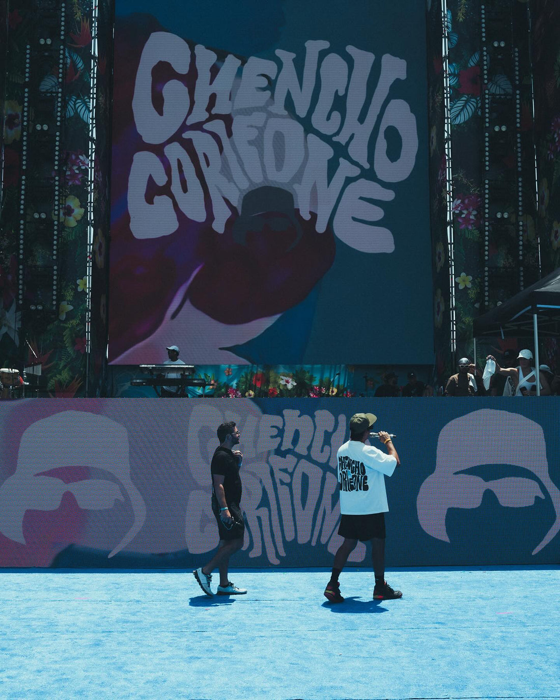 Chencho Corleone event environment with team members wearing Xtextile custom merchandise