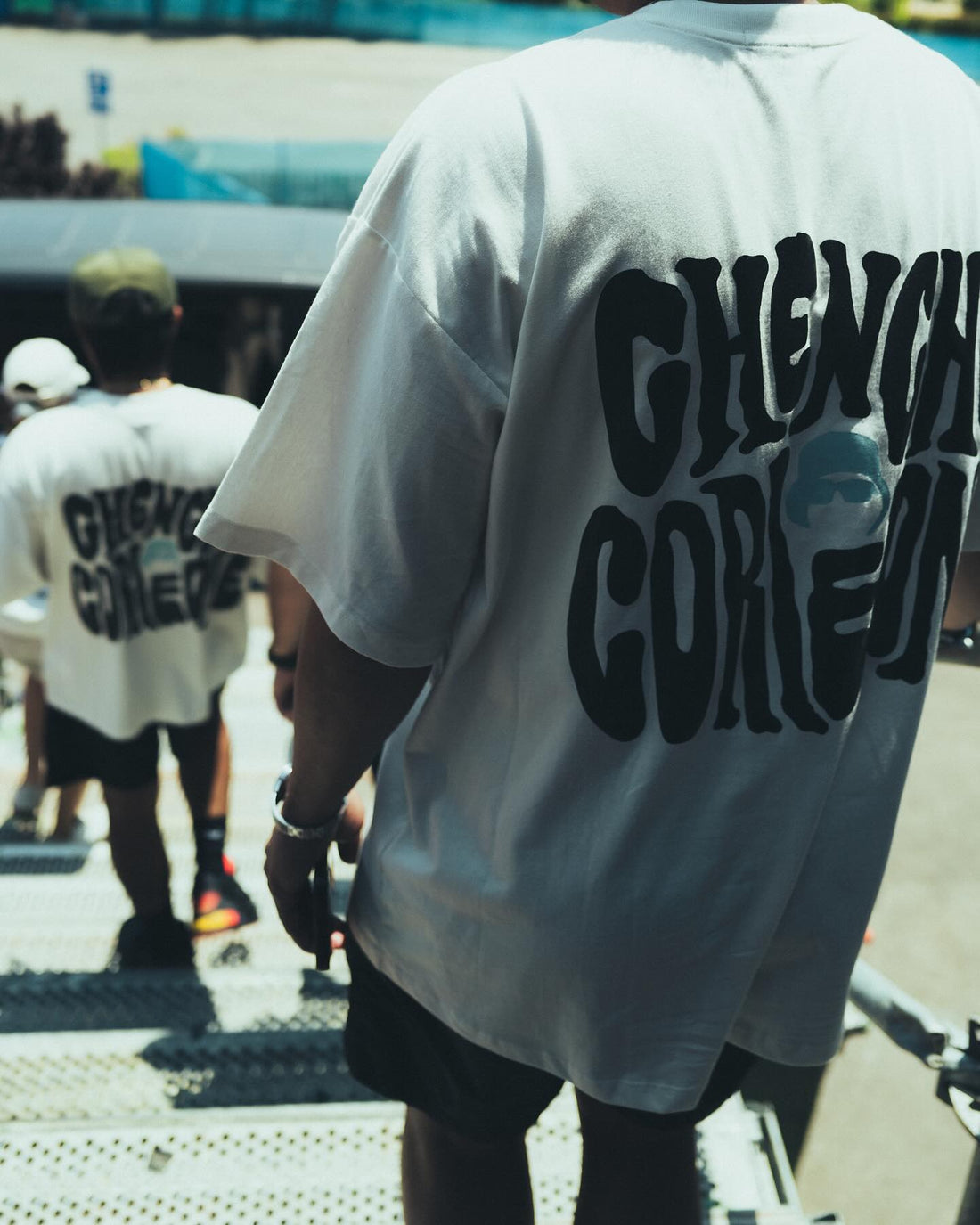 Back graphic of Chencho Corleone off-white merchandise worn after delivery